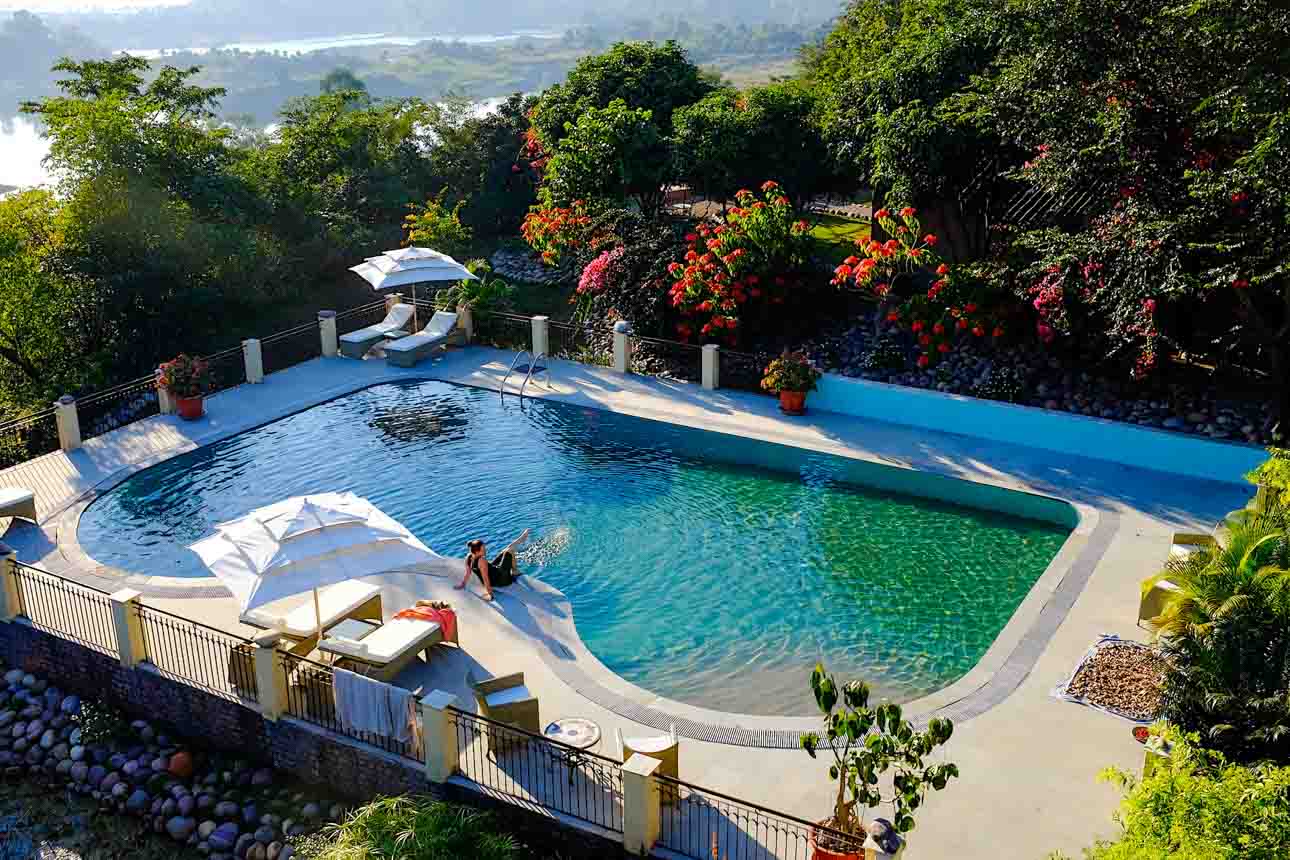 Basunti Retreat lakeside pool in Himachal Pradesh, India